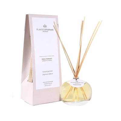 Fragrance Diffuser - Oriental Wood - This diffuser will adorn your interior while diffusing subtle and constant scents.

Delicately disposed in the bottle, the rattan sticks will get soaked with perfume diffusing it during several weeks.

This powerful and secret fragrance reveals citrus notes of patchouli, vanilla and rose to create an intense and noble scent.

Head: Orange / Rosemary / Bergamot
Heart: Geranium / Patchouli / Rose
Base: Musk / Tonka beans / Vanilla

User Tips

Remove the cap and dip the natural rattan sticks into the bottle.? The sticks will be soaked with perfume and the scent will regular diffuse into the air for 1 to 2 months depending on the environment. From time to time gently move the rattan sticks to get a more intense diffusion.

Precautions

Do not swallow. Avoid contact with eyes. Keep out of reach of children. Keep away from heat. Do not place sticks on waxed or varnished furniture